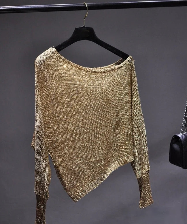 Blusa asimétrica con lentejuelas