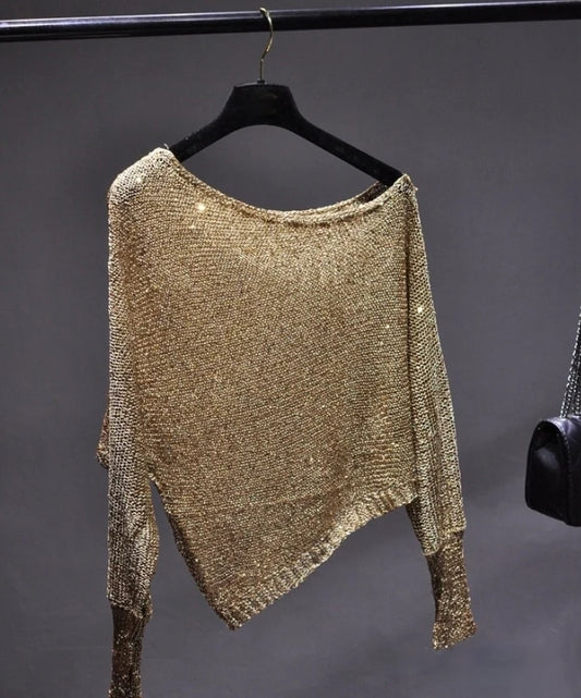 Blusa asimétrica con lentejuelas