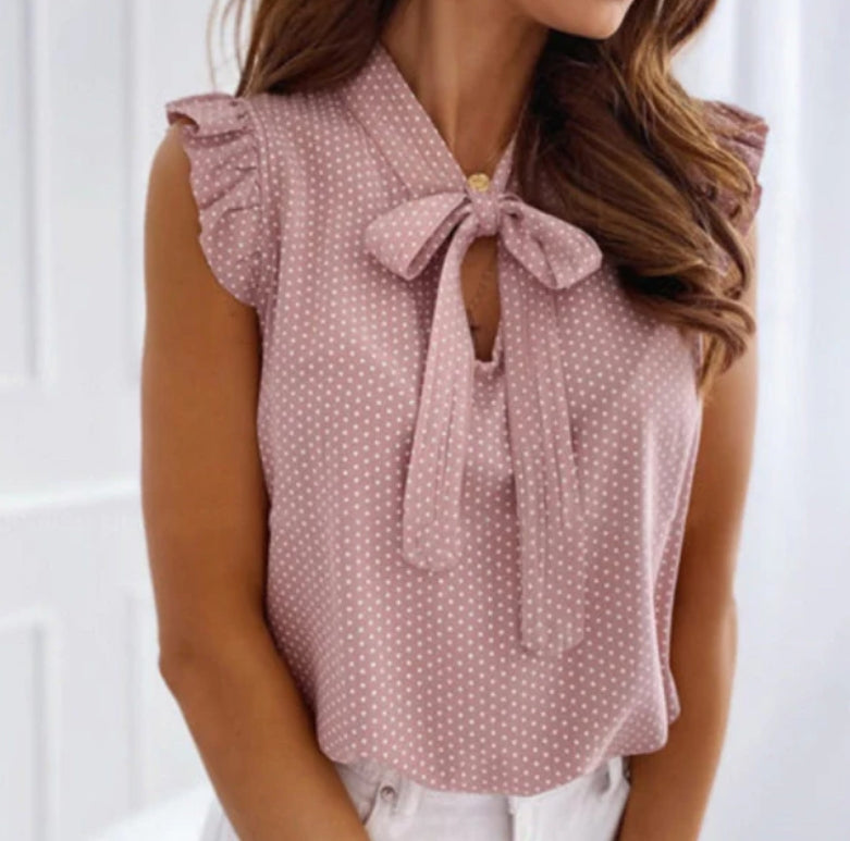Blusa de lunares con volantes