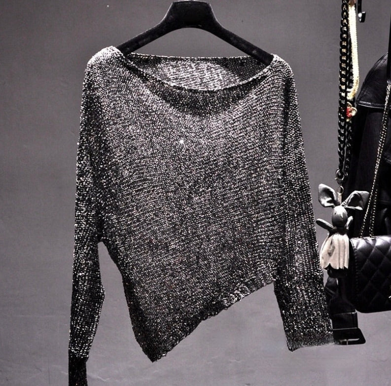 Blusa asimétrica con lentejuelas