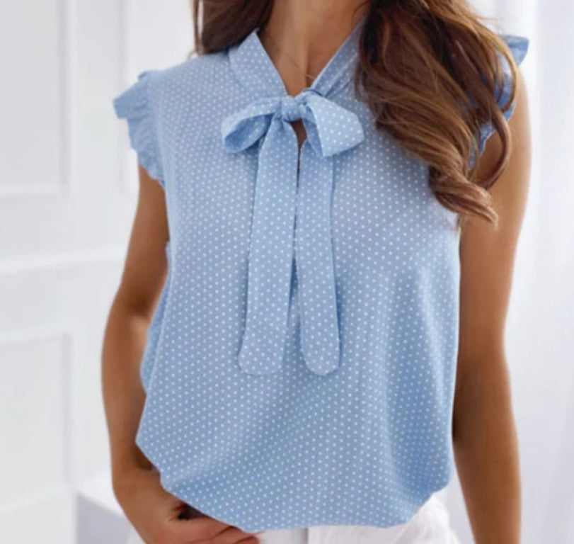 Blusa de lunares con volantes